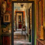 A colorful home art installation filled with handmade sculptures and paintings